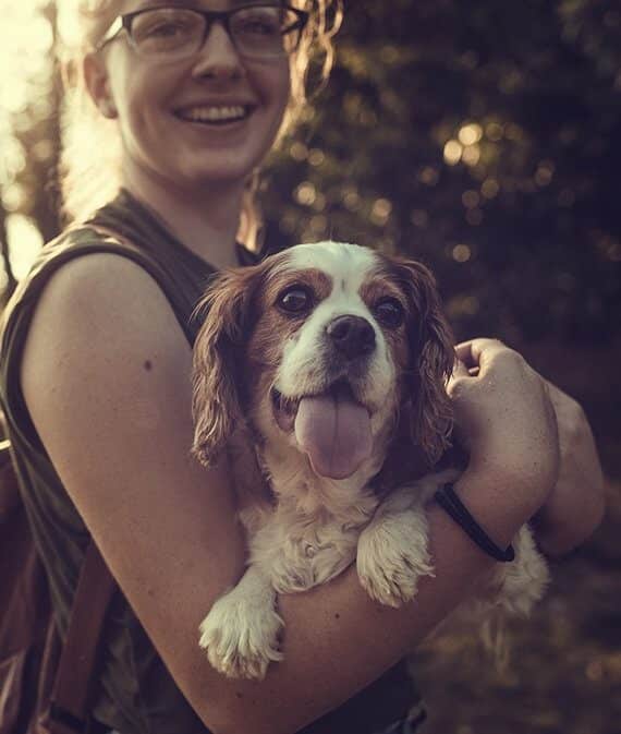 Dog with smiling girl