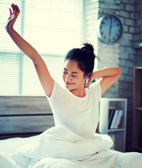 Woman waking up relaxed